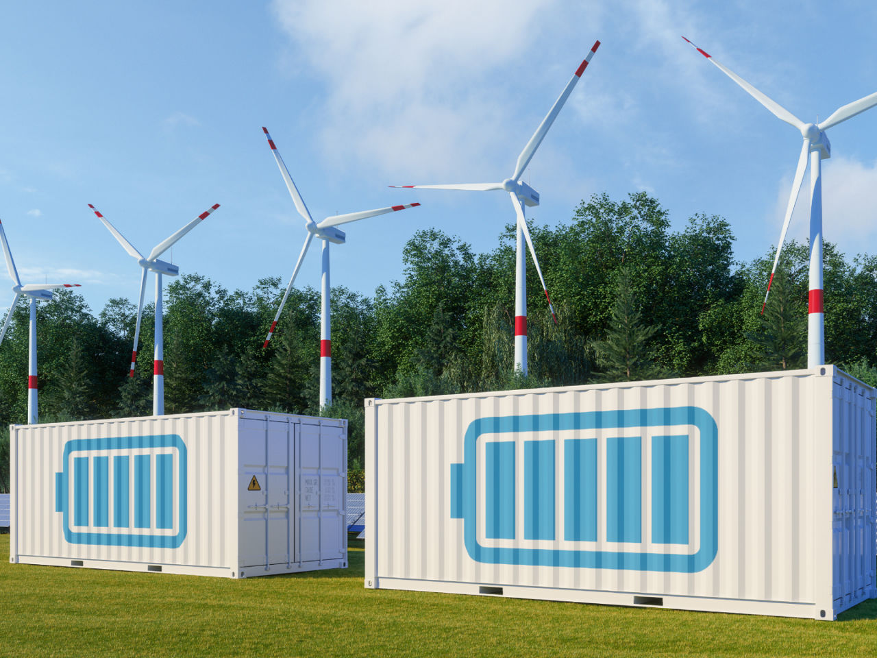 Battery storage containers with windmills, solar panels and trees. 