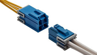 Male and female wire-to-wire connectors aligned for mating, featuring a positive locking mechanism with Terminal Position Assurance (TPA).
