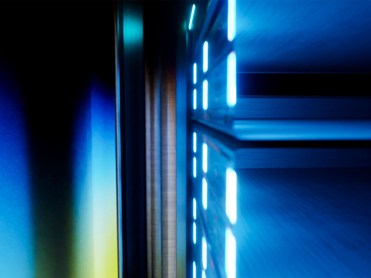 Abstract blue light streaks illustrating dynamic data flow and high-speed information transfer.