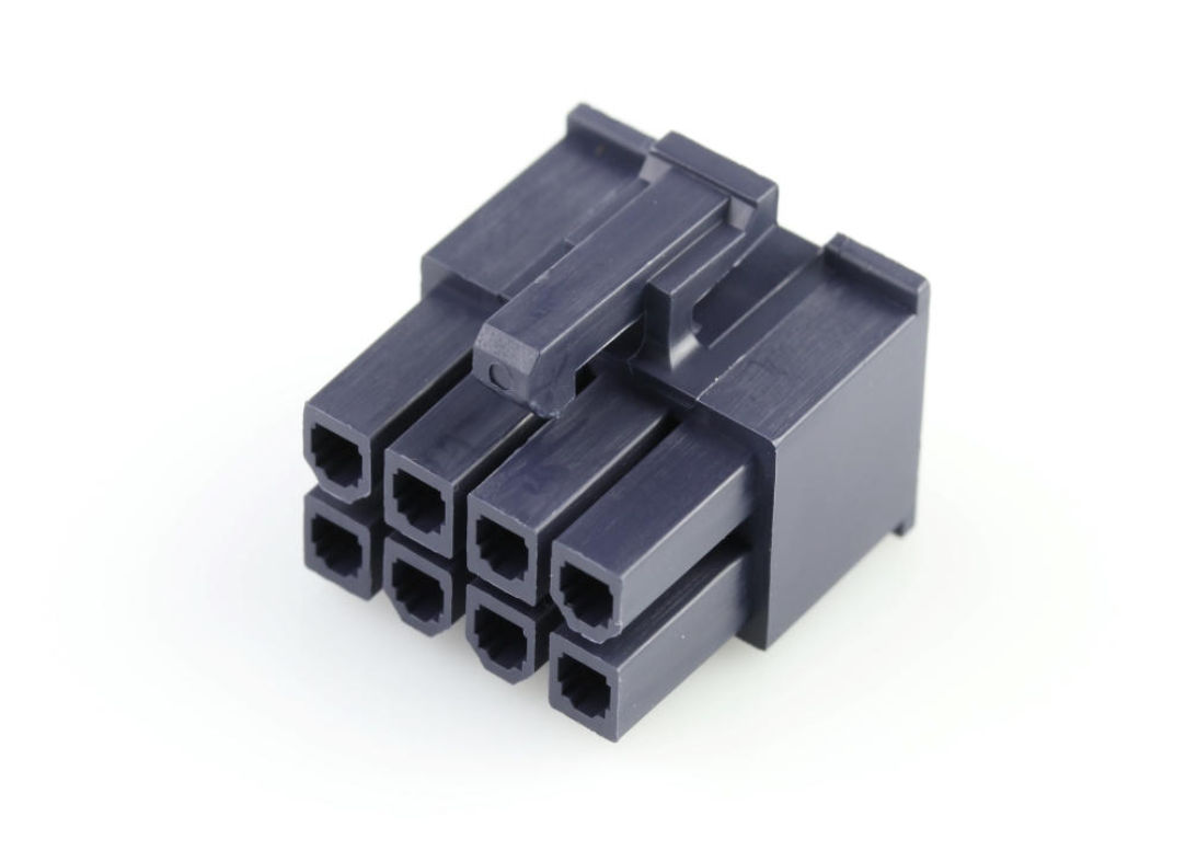 Mini-Fit Jr. receptacle housing shown. Asymmetric cavity shape ensures mating occurs in only one orientation.