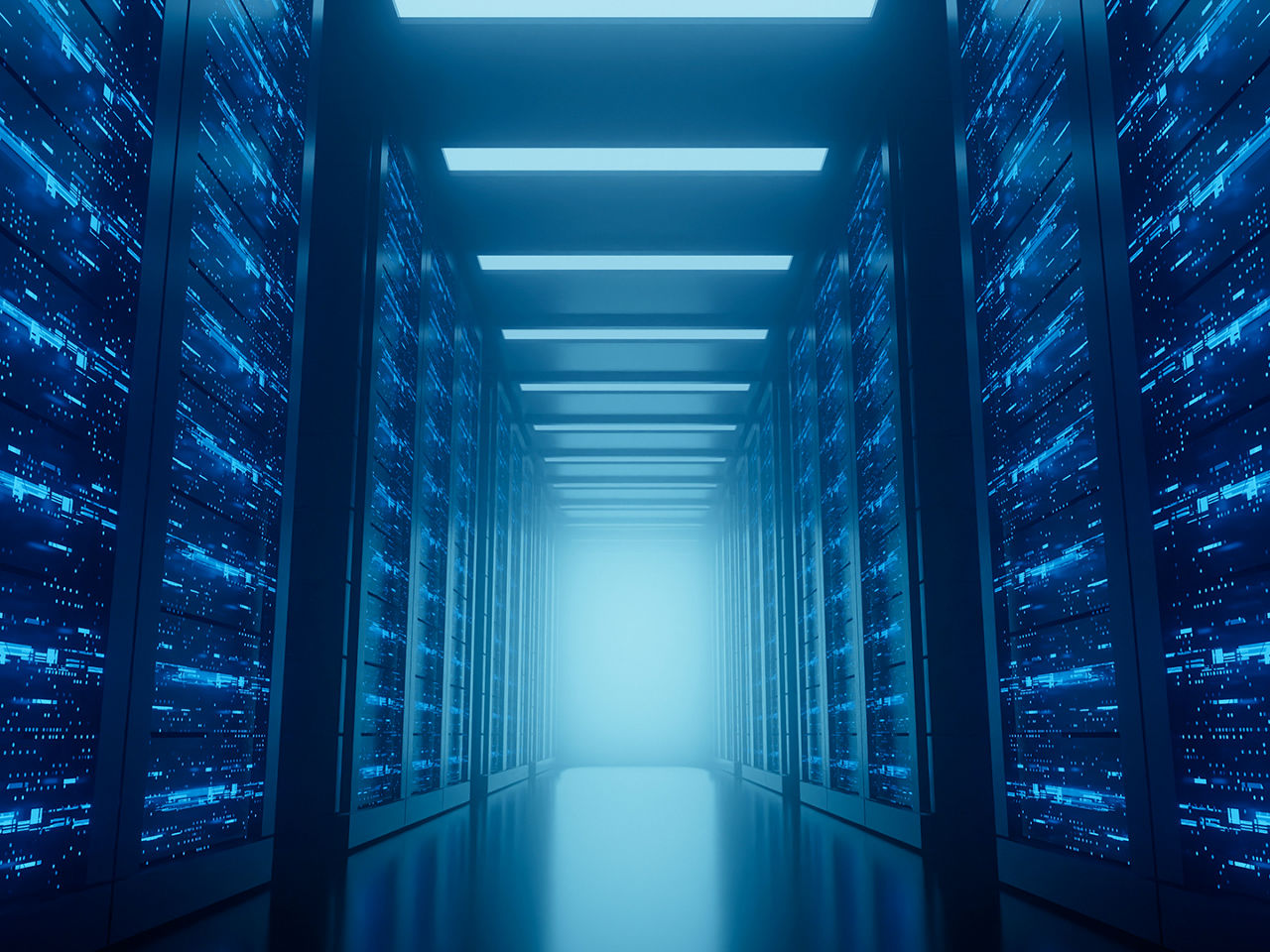 Data center server racks with liquid-cooled hardware.