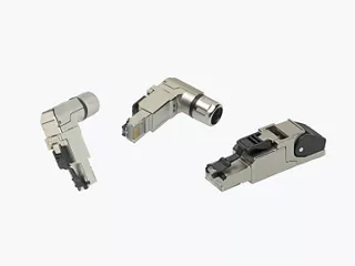 Close-up of three angled RJ45 shielded connectors. 